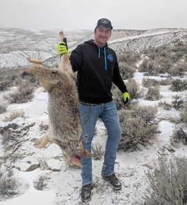 man holding wolf